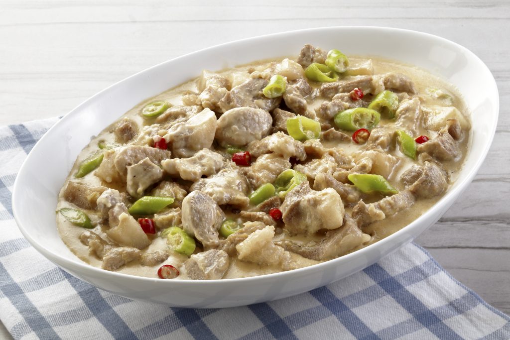Bicol Express is made with pork and chilis cooked in coconut milk.